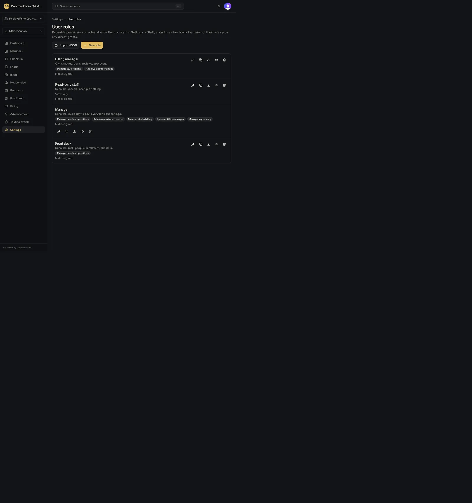 The User roles list, each role with its permissions and assignment count